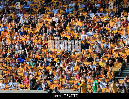 Wolverhampton, UK. 20th Apr, 2019. Wolverhampton Wanderers fans watch in the sunshine Credit: Paul Roberts/OneUpTop/Alamy Live News