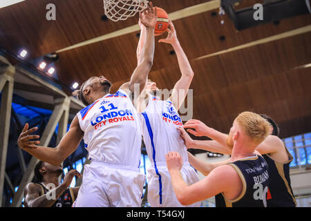 London, UK, 20th April 2019. Royals' Matthew Bryan-Amaning (11) and Will Neighbour (15) finish a point under the basket. Tensions run high in the London City Royals v Glasgow Rocks BBL Championship game at Crystal Palace Sports Centre. Home team LCR win the tight game 78-70. Credit: Imageplotter/Alamy Live News Stock Photo