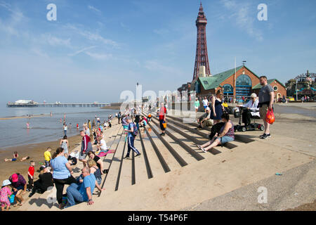 Blackpool, Lancashire. 21st April, 2019. UK Weather.  Bright sunny start to the day at the coast as people take to the seafront promenade for a light exercise and to enjoy the sea breeze on what is forecast to be the hottest day of the Easter holidays. Credit; MediaWorldImages/AlamyLiveNews. Stock Photo