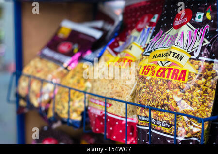 Colorful packaging of the top chip FMCG brands in indian retail stores  Stock Photo