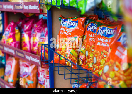 Colorful packaging of the top chip FMCG brands in indian retail stores  Stock Photo