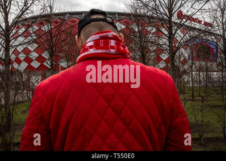 Football fan near the central entrance of the Spartak football stadium 'Otkritie Arena' in Tushino district of Moscow city, Russia Stock Photo