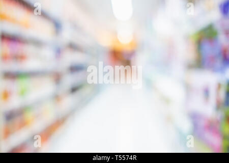 Blur grocery store supermarket background with fresh product on shelf in aisle. consumer product marketplace backdrop. Stock Photo