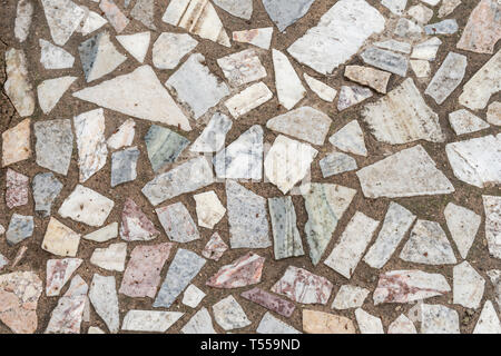 Mosaic stones at the archaeological site on the floor of one room Stock Photo