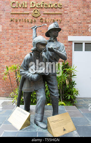 Sculptures for the recognition of fire fighters who risk their lives display outside Singapore Central Fire Station in the city Stock Photo