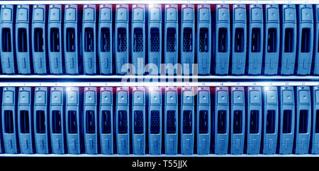 Server hard drives SATA in the data center server room. Disk storage array Stock Photo