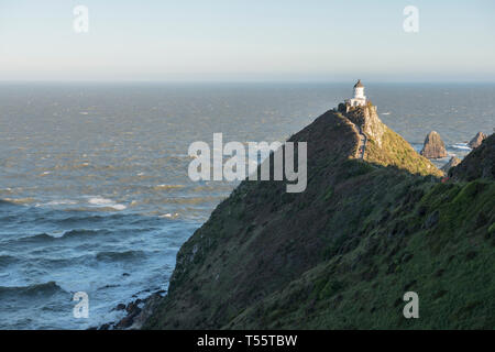 Lighthouse on Nugget Point in Otago, New Zealand Stock Photo