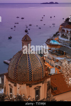 Patterned church dome at sunset in Positano on Amalfi Coast, Italy Stock Photo