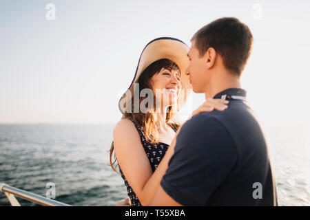 Young couple on pier Stock Photo