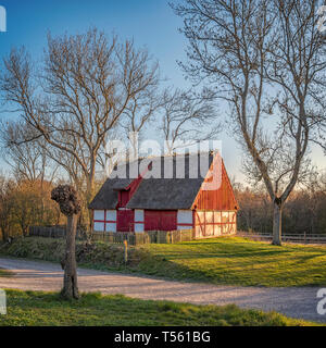 An old thatched barn near to Raus Church in Sweden. Stock Photo
