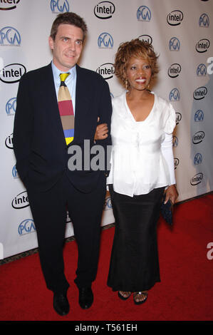 LOS ANGELES, CA. January 22, 2006: Actress ALFRE WOODARD & husband producer RODERICK SPENCER at the 2006 Producers Guild Awards at the Universal Hilton Hotel. © 2006 Paul Smith / Featureflash Stock Photo