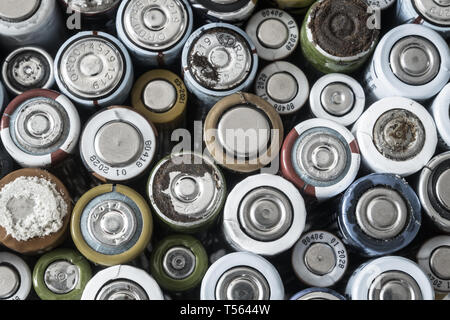 Group of used disposable drain batteries of various size Stock Photo