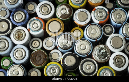 Group of used disposable drain batteries of various size Stock Photo