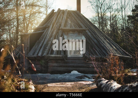 A traditional wooden log cabin on in the forest Stock Photo