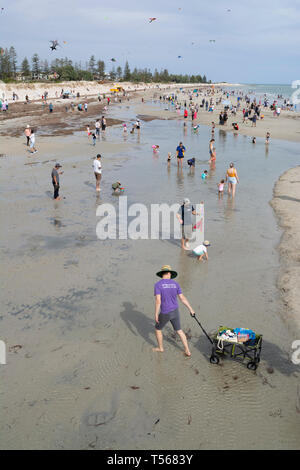 Semaphore, South Australia, Australia - April 20, 2019: Crowds of spectators enjoying the beach at the Adelaide International Kite Festival 2019 Stock Photo