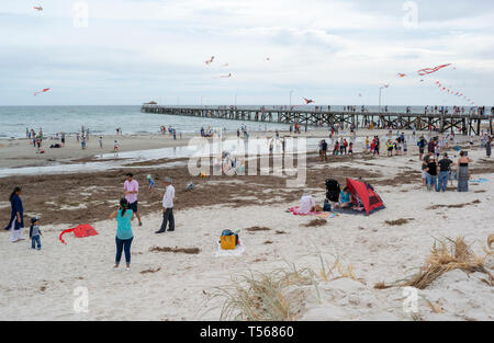 Semaphore, South Australia, Australia - April 20, 2019: Crowds of spectators and the jetty at Adelaide International Kite Festival 2019 Stock Photo