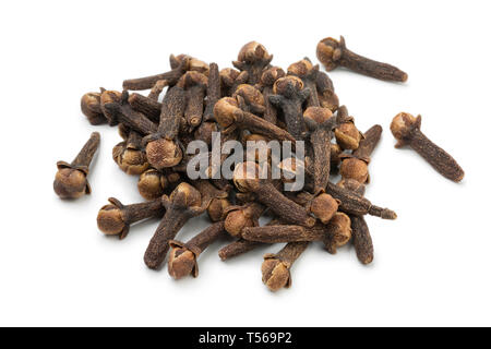 Heap of aromatic dried cloves isolated on white background Stock Photo