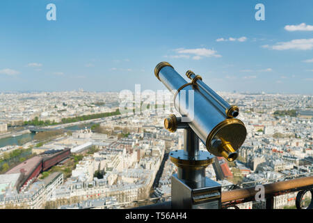Monocle or tourist telescope on the observation deck with cityscape Stock Photo