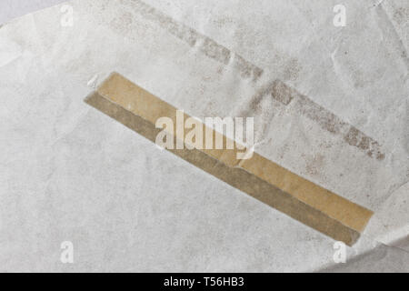 Old abstract paper textured backgrounds with old yellow tape Stock Photo
