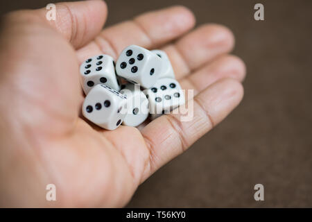 Hand fill with dice, ready to throw dice. Stock Photo