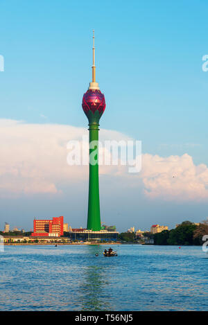 Colombo, Sri Lanka - April 5, 2019: Lotus tower over Beira lake in the capital city of Sri Lanka Stock Photo