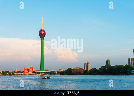 Colombo, Sri Lanka - April 5, 2019: Colombo skyline over Beira lake with modern business and residential buildings in the capital city of Sri Lanka Stock Photo