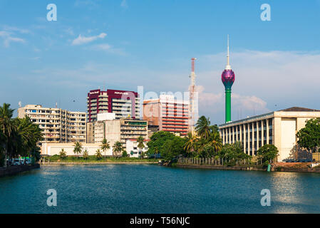 Colombo, Sri Lanka - April 5, 2019: Colombo skyline over Beira lake with modern business and residential buildings in the capital city of Sri Lanka Stock Photo