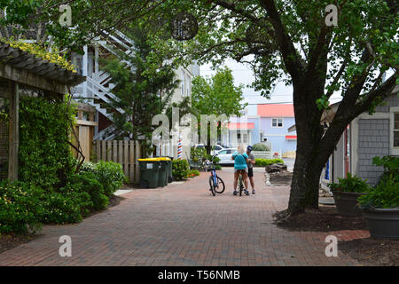 A quiet side alley with shops in downtown Manteo on the Outer Bank's Roanoke Island, North Carolina. Stock Photo