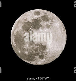 A full moon isolated against a black night sky in high resolution with ...