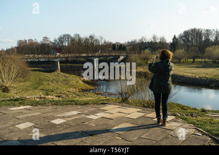 River with a bridge in the backround in Sabile, Latvia Stock Photo