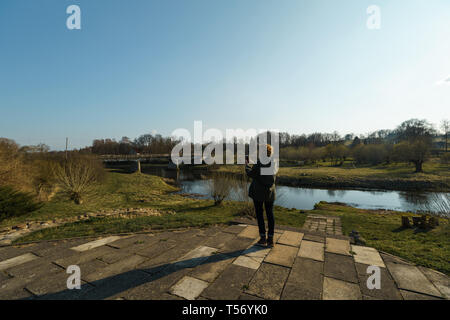 River with a bridge in the backround in Sabile, Latvia Stock Photo
