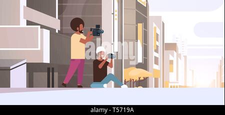 photographer and cameraman using cameras shooting video taking pictures working together over modern city buildings exterior cityscape background Stock Vector