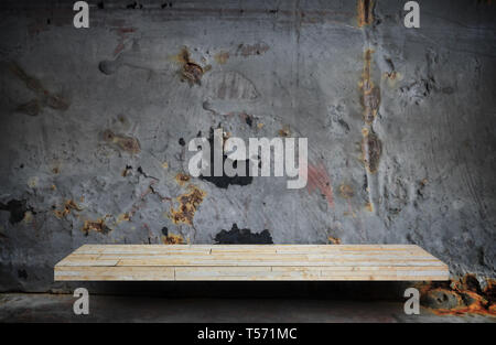 Empty stone shelf on rustic metal wall for product display Stock Photo