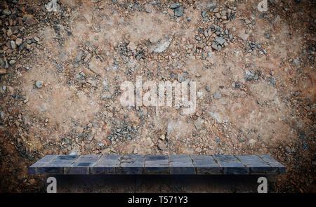 Empty display shelf on grungy dirt for product display Stock Photo