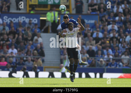 Liverpool, UK. 21st Apr, 2019. Anthony Martial of Manchester United and Michael Keane of Everton challenge for the ball. Premier League match, Everton v Manchester Utd at Goodison Park in Liverpool on Sunday 21st April 2019. this image may only be used for Editorial purposes. Editorial use only, license required for commercial use. No use in betting, games or a single club/league/player publications. pic by Chris Stading/Andrew Orchard sports photography/Alamy Live news Credit: Andrew Orchard sports photography/Alamy Live News Stock Photo