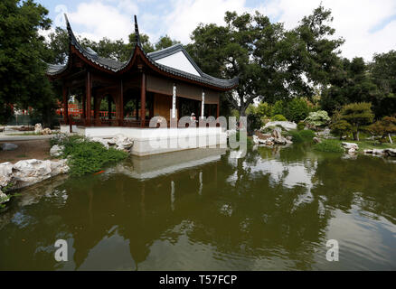 Los Angeles, USA. 21st Apr, 2019. Photo taken on April 21, 2019 shows a view of the Chinese garden Liu Fang Yuan inside the Huntington Library, Art Collections and Botanical Gardens in Los Angeles, the United States. Inspired by Chinese gardens of Suzhou, a Chinese city renowned for its ancient gardens, Liu Fang Yuan, or the Garden of Flowing Fragrance, is one of the largest Chinese-style gardens overseas. The word 'liu fang', or 'flowing fragrance', refers to the scent of flowers and trees, including the pine, lotus, plum, and other plants found here. Credit: Li Ying/Xinhua/Alamy Live News Stock Photo