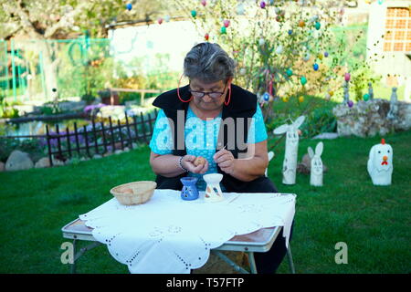 Prague, Czech Republic. 22nd Apr, 2019. A woman paints an Easter egg for Easter celebration in Prague, the Czech Republic, April 22, 2019. Credit: Dana Kesnerova/Xinhua/Alamy Live News Stock Photo