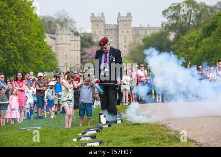 Windsor, UK. 22nd April 2019. John Matthews, borough bombardier, supervises children in firing a small cannon as part of a traditional 21-gun salute on the Long Walk in front of Windsor Castle for the Queen's 93rd birthday. The Queen’s official birthday is celebrated on 11th June. Credit: Mark Kerrison/Alamy Live News Stock Photo