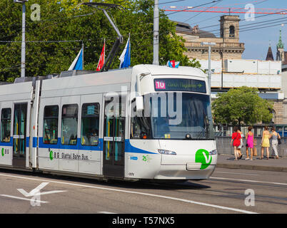 Zurich, Switzerland - August 1, 2018: a tram of the VBG company heading to the Zurich Airport passing along the Bahnhofbrucke bridge in the city of Zu Stock Photo