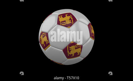 Soccer ball with the flag of Sri Lanka colors on black, 3d rendering Stock Photo