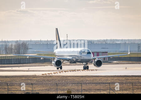 Kyiv, Ukraine - March 17, 2019: Lufthansa Airbus A320 taxiing to the runway in the airport Stock Photo