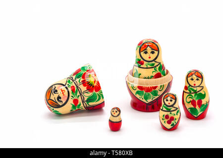 Matryoshka Dolls isolated on a white background. Russian Wooden Doll Souvenir. Russian nesting dolls, stacking dolls. Stock Photo