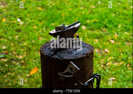 A hammer on an anvil. The tool uses a blacksmith in a blacksmith shop Stock Photo