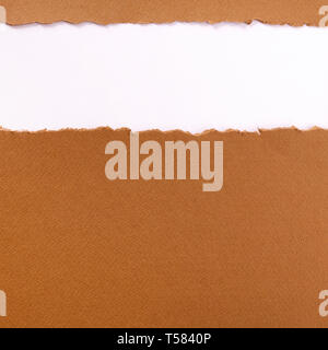 Torn brown paper strip background frame Stock Photo