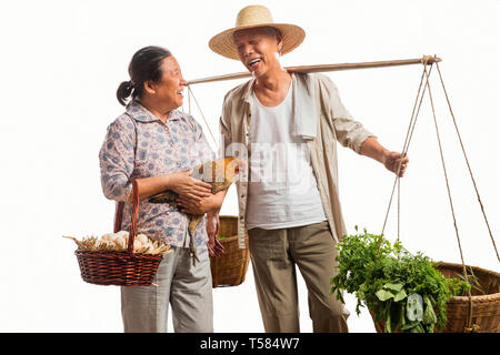 Farmers couples with vegetables and poultry Stock Photo
