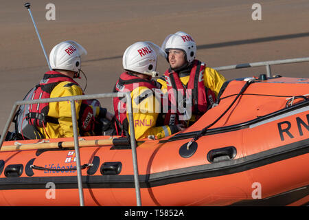 H M Coastguards, Lifeguards and inshore rescue lifeboat crew join forces in training exercises at local hot spot in Blackpool, UK Stock Photo