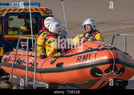 H M Coastguards, Lifeguards and inshore rescue lifeboat crew join forces in training exercises at local hot spot in Blackpool, UK Stock Photo