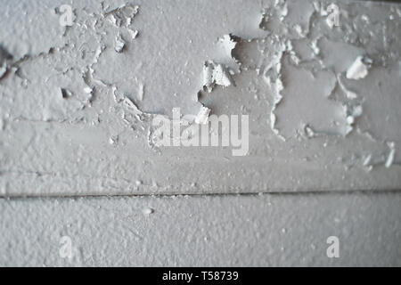 Old peeled silver painted wall Stock Photo