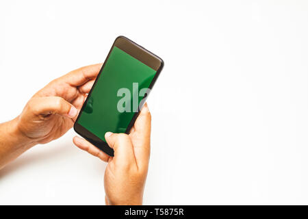 top view of hands holding a mobile phone Stock Photo
