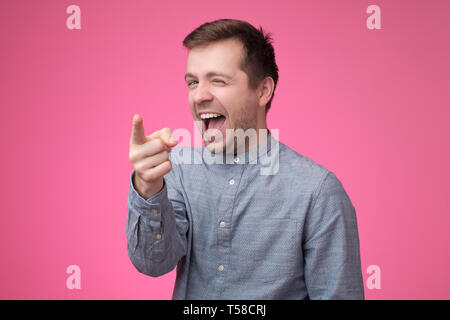 Hey you concept. Happy man pointing on you. Stock Photo